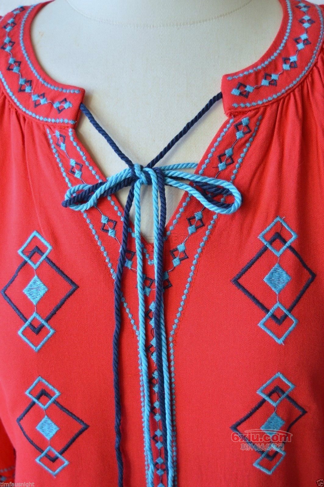 竖条几何对称手袖